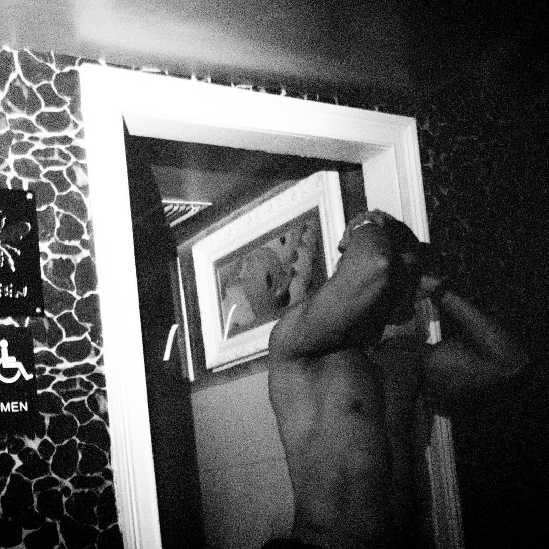 Black and white mirror photo from a past Midnight Service